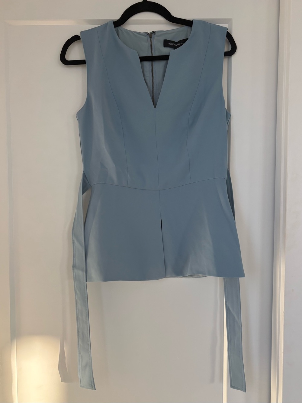 BCBGMaxAzria Light Blue Sleeveless Peplum Top.